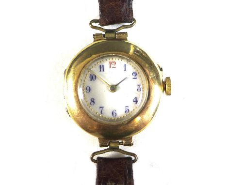 An Edwardian 18ct gold cased lady's wristwatch, circular white enamel dial, blue enamelled Arabic numerals with red '12', gol