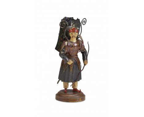 METAL CHINESE SOLDIER Europe, 19th Century Figure standing on a wooden base, an arrow in the right hand and a bow in the left