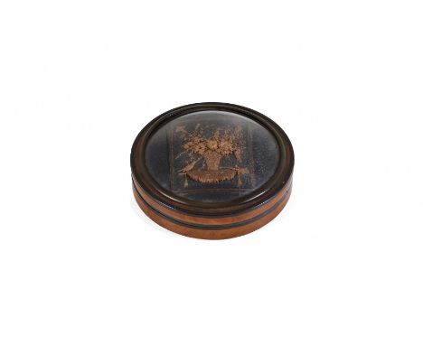 BRIAR SNUFF BOX WITH CARVED FLOWERS Giuseppe Maria Bonzanigo, early 19th Century Circular, with ebonized wood rims, a carved 