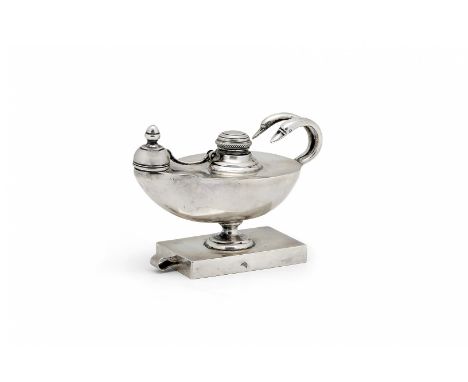 OIL LAMP Rome, 1810 circa On rectangular base, smooth, the double handle in form of swan heads, with clamp inserted into the 