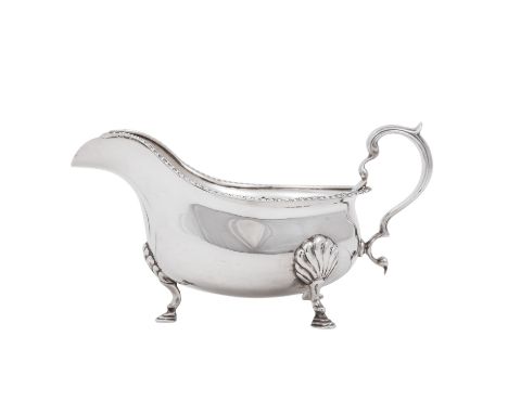 BIRMINGHAM Saucière, 925 Silber, 1934, auf dreifüßigem Stand, glatte Wandung, geriffeltes Randdekor, ohrenförmige Handhabe, L
