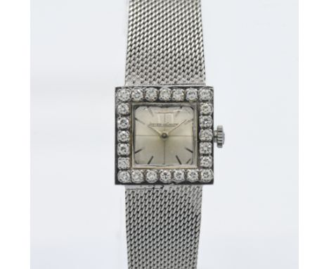 Jaeger-LeCoultre, ladies white gold cocktail watch, the square silvered dial set with a border of diamonds and baton numerals