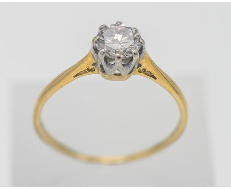 An 18ct yellow gold brilliant cut solitaire ring, measured 0.59ct total diamond weight, hallmarked London 1978, colour J/K, c