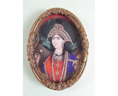 A 19th century Indian watercolour on ivory miniature portrait of a princess in elaborate headdress - 6 x 4cm