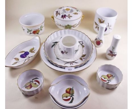 A group of Royal Worcester Evesham comprising casserole dish, flan dish, circular serving bowl, souffle dish, cruet, two rame