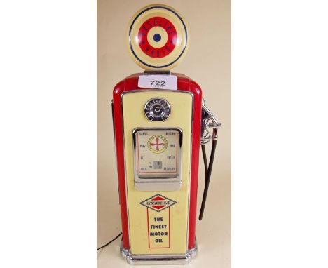 A novelty radio in the form of a vintage gasoline pump