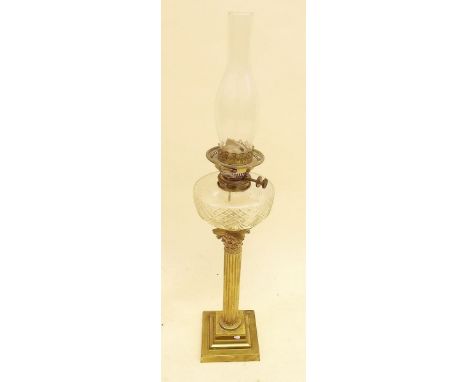 A Victorian corinthian column oil lamp with cut glass reservoir