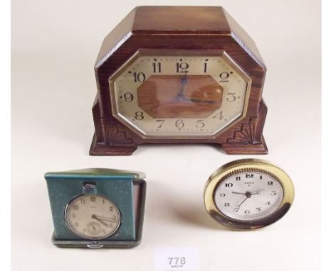 An Art Deco 8 day oak cased mantel clock, an Oris travel clock and a Swiza 8 day alarm