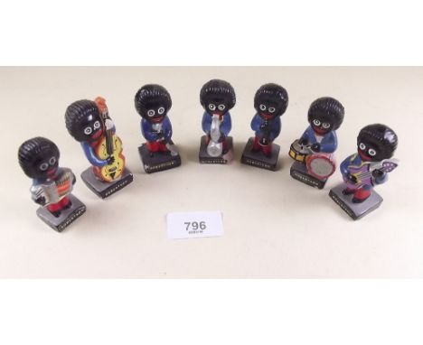 A vintage seven piece Robertson Golly Band