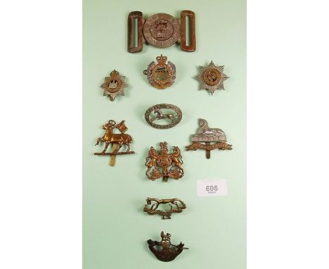 A Victorian Army belt buckle and various assorted badges