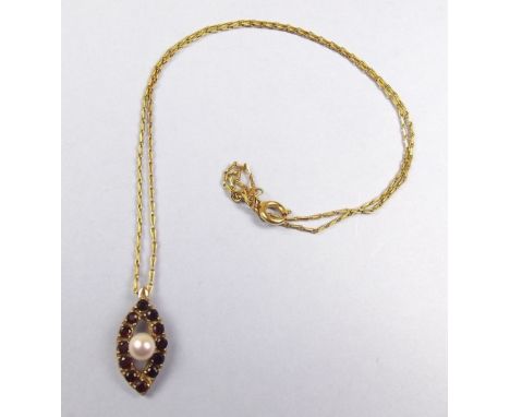 A 9 carat gold ruby and pearl pendant on gold plated chain