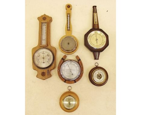 An oak Negretti and Zambra barometer and five other barometers