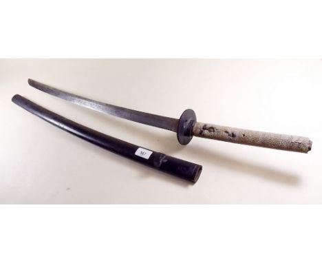 A late 19th Japanese sword with shagreen handle, iron tsuba and wooden scabbard