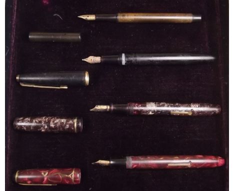 Four vintage pens including Waterman and Parker etc