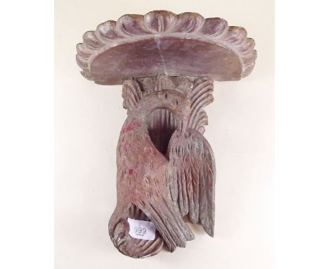 An 18th century carved and painted wall shelf decorated  mythical bird - 27cm