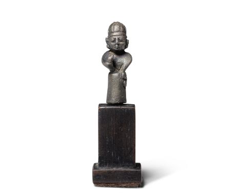 A small Hittite silver statuette of a priest or deityCirca 1400-1200 B.C.3cm high excl. pegFootnotes:Provenance:R. Symes Gall