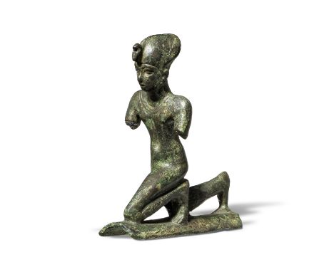 An Egyptian bronze statuette of a kneeling kingLate Period, circa 664-332 B.C.8.9cm high Footnotes:Provenance:Charles Bouché 