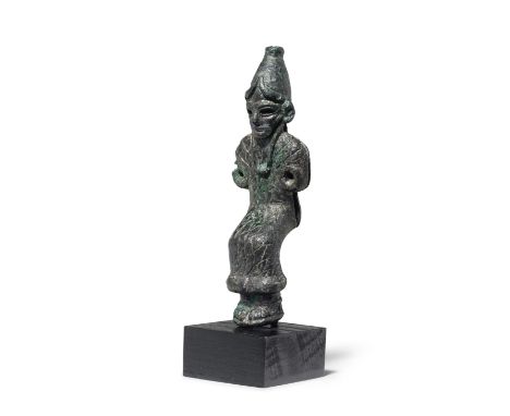 A Canaanite bronze seated deityLate Bronze Age, circa 1500-1000 B.C.10.6cm highFootnotes:Provenance:Nishan Kalebjian collecti