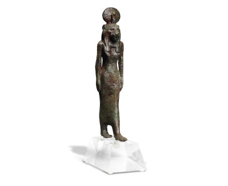 An Egyptian bronze striding WadjetLate Period, circa 664-332 B.C.25cm highFootnotes:Provenance:Reputedly discovered in 1886 d