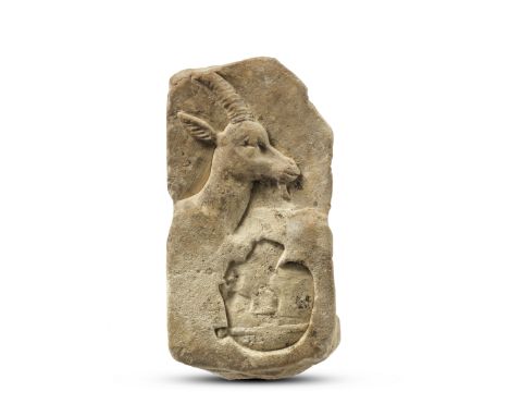 An Egyptian limestone double-sided sculptor's model with heads of a Pharaoh and a gazelleNew Kingdom, 19th-20th Dynasty, circ