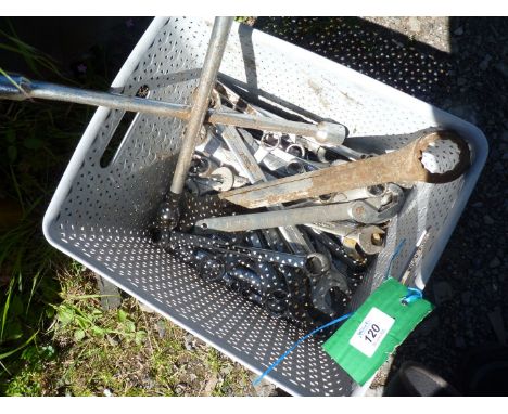 A tray of various spanners, wheel wrench, etc.