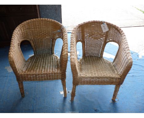 Two Lloyd Loom style chairs and two stools.