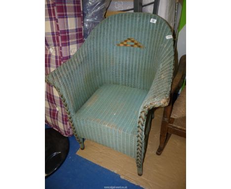A Lloyd Loom chair.