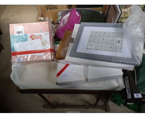 A quantity of nursery items to include: baby gift sets, photograph frames, cot mattress, etc.