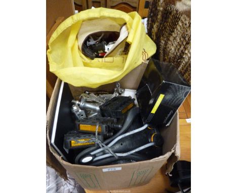 Two boxes of bicycle parts to include; pedals, crank sets, etc.