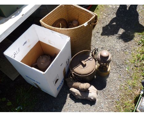A linen basket and box containing a large pestle and mortar, cooking pot, kettles, tilly lamps, etc.