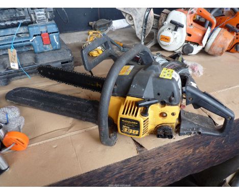 A "McCulloch" petrol chainsaw (engine stiff to turn, but appeared to have good compression at the time of lotting).