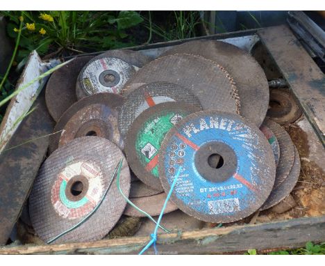 Two boxes of angle grinder blades, saws, sander, etc.