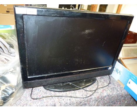 A "Hitachi" 26" TV.