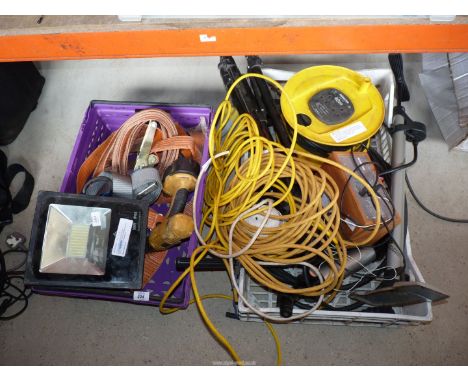 Two boxes of miscellaneous to include: ratchet straps, flood light, extension leads, a radio, etc.