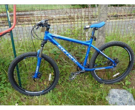 A "Carrera" mountain bike with 24-speed derailleur gears and disc brakes. [back brake not working].