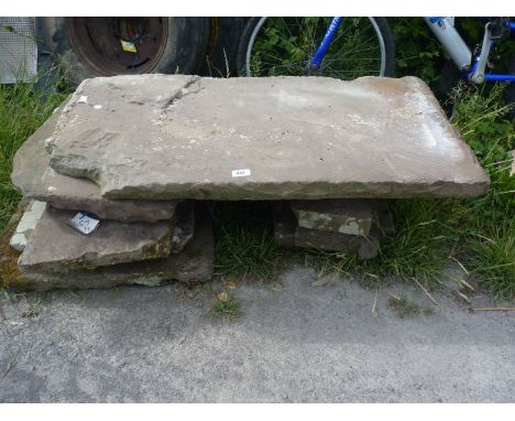 A quantity of flagstone slabs.