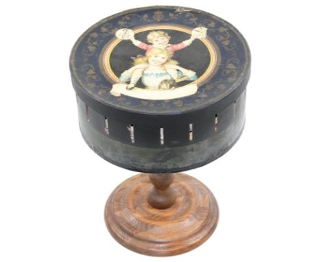 Zoetrop.: (Zootrop, Lebensrad). Papp.-Bildertrommel mit ausgestanzten Sehschlitzen (Durchm. ca. 27,5 cm., Höhe 12,2 cm.), mit