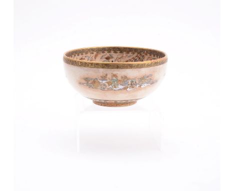 Kinkozan: A Japanese Satsuma Pottery Bowl, of circular form resting on a low foot and typically decorated in overglaze enamel