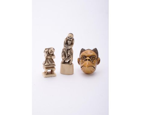 Y An Ivory Seal Netsuke, the oval base surmounted with a figure of a bearded sage seated on the back of an ox, details etched