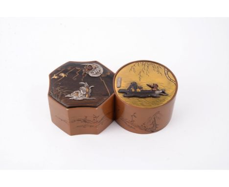 A Japanese Copper "Double Box", of part circular, part octagonal form, the sides chased in katakiribori with a figure and a m