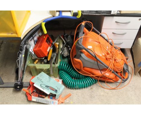 A FLYMO ELECTRIC MOWER TOGETHER WITH A QUANTITY OF ASSORTED TOOLS