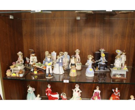 A QUANTITY OF LAURA DUNN CERAMIC FIGURES