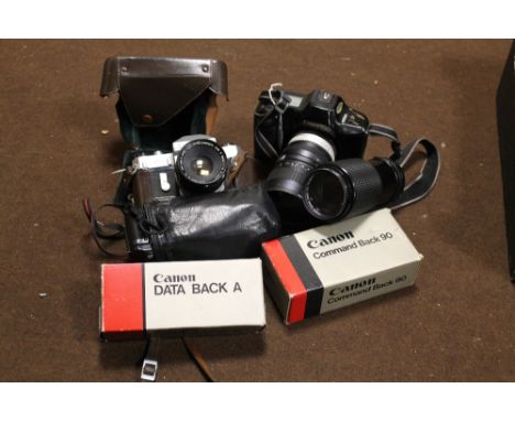A TRAY OF VINTAGE CAMERAS AND LENSES, TO INCLUDE A CANON T90
