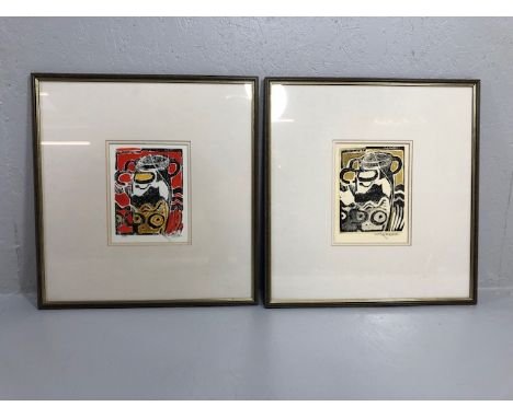 Art work, a pair of late 20th century framed wood block prints  signed J Disakem geometric designs in apposing colours both a