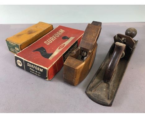Vintage tools, 3 vintage woodworking planes and a Surform in its box 