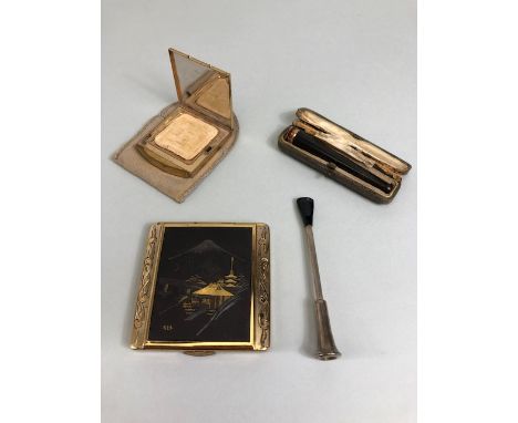 9ct gold mounted cigarette holder, 925 silver cigarette holder and  2 vintage powder compacts one with a  Japanese panel