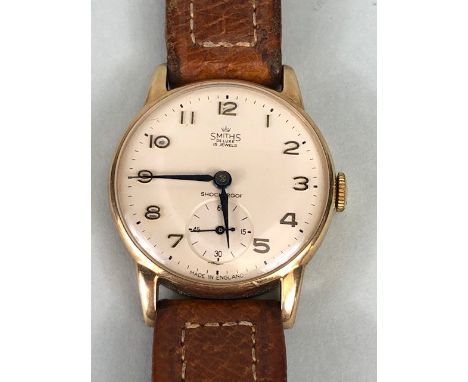 Smiths Deluxe Gold watch, a 9ct gold manual wind gentleman's wristwatch, 15 jewels sets winds and runs inscribed to back. Rai