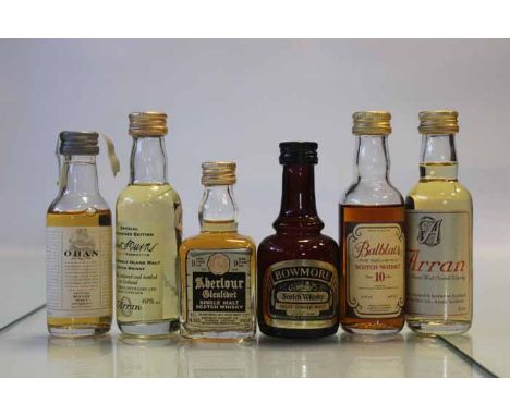 6 ASSORTED SINGLE MALT SCOTCH WHISKIES
Includes Oban 14, Aberlour Glenlivet 9 (1 2/3 fl. ozs.), Arran, Bowmore De Luxe, Rober