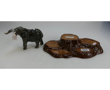 Beswick Elephant with trunk stretched 974 (tusk broken) and tree trunk stand (2)