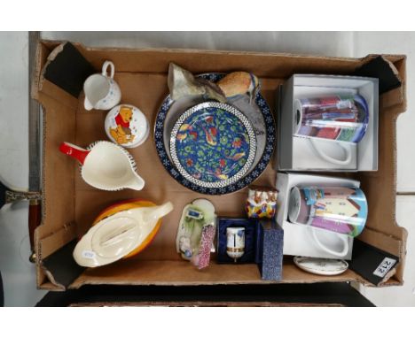 A mixed collection of ceramic items to include, hand painted novelty tea pot, boxed Royal Worcester mugs, Royal Doulton D4031